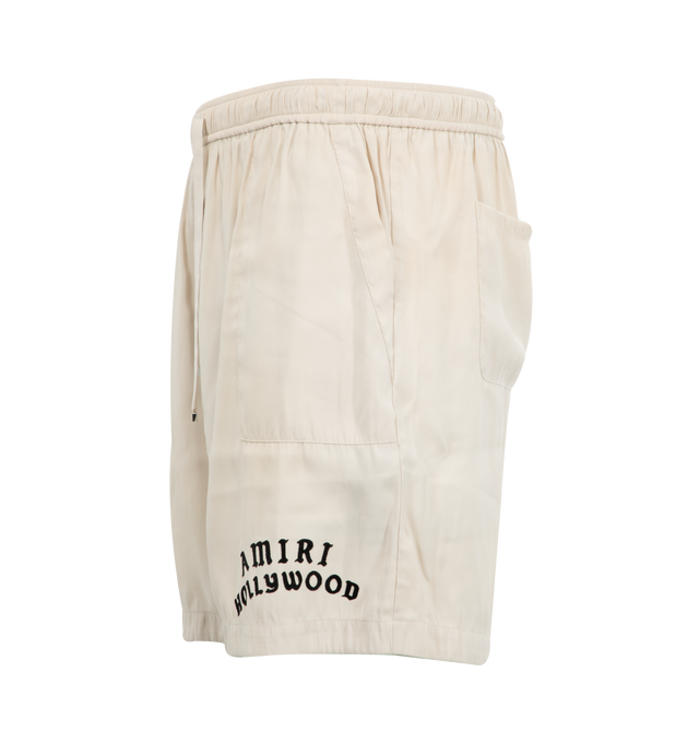 Image 3 of 3 - WHITE - AMIRI Hollywood Short featuring side pockets, back patch pockets, an elastic waist with drawcord and logo on leg. 87% modal, 13% polyester. 