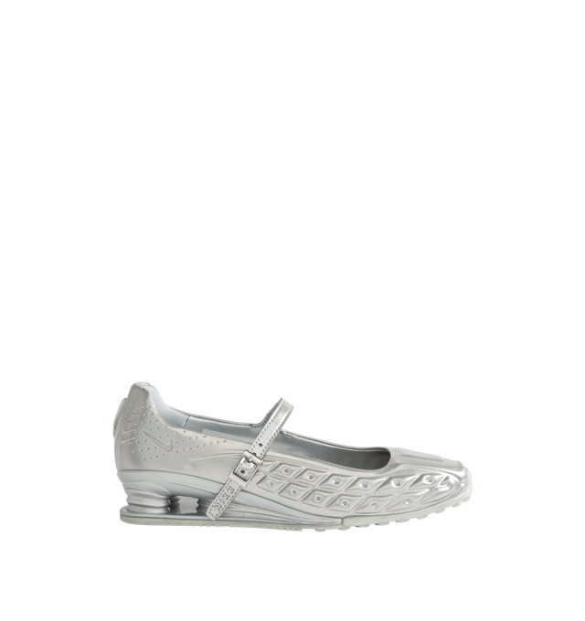 Image 1 of 5 - SILVER - Nike Womens Shox Z Calistra Shoe is a ballet-inspired flat on top of sleek sneaker-inspired heel cushioning. Designed with an adjustable midfoot strap, Nike Shox Z cushioning pillars, signature Nike and Shox branding, and durable rubber outsole. Upper: Synthetic Leather; Cushioning: Nike Shox Z; Outsole: Rubber. Imported 