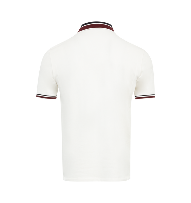 Image 2 of 2 - WHITE - MONCLER Logo Polo featuring cotton piquet, collar, button placket closure, short sleeves and felt logo patch. 100% cotton. 