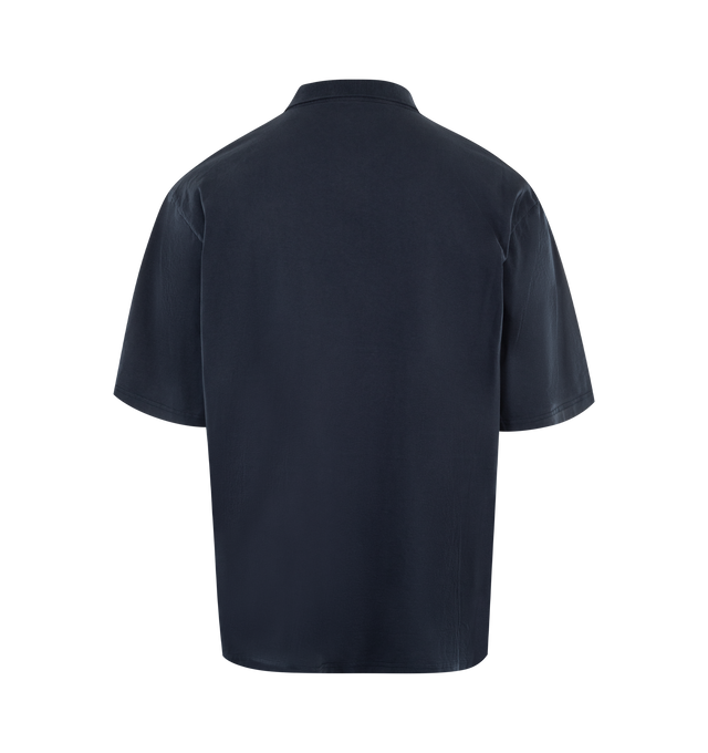 Image 2 of 2 - NAVY - MARTINE ROSE Oversized Panelled Polo featuring short sleeves, contrasting stitched panels, appliqued cotton 'riot' flyer and seasonal crest artwork, fold down collar and button closure. 100% cotton.  