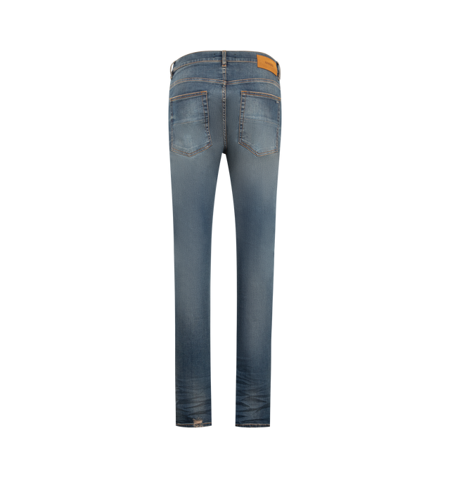 Image 2 of 3 - BLUE - Amiri Men's MX1 Jeans from the Autumn-Winter 2026 collection are crafted from stretch cotton denim and feature the house's iconic hand-distressed construction, repaired with python-embossed leather for a signature textured finish. Designed with classic five-pocket detailing, these designer jeans undergo a specialized treatment that creates intentional variations in shading and color, giving each pair a distinctive character. Main Material: 92% Cotton, 6% Elastomultiester, 2% Elastane.  