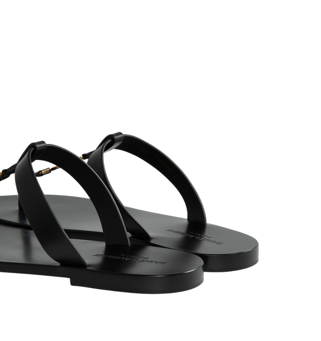Image 3 of 4 - BLACK - SAINT LAURENT Cassandre Slides featuring flat sandal, t-strap arch band, metal cassandre on front and leather sole. Made in Italy.  