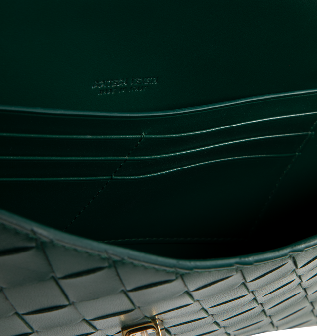 Image 3 of 3 - GREEN - BOTTEGA VENETA Andiamo Clutch featuring top handle, intrecciato leather with signature metallic knot closure, six card slots and one additional pocket. 5.1" x 12.2" x 1.2. Lambskin, calfskin. Made in Italy. 