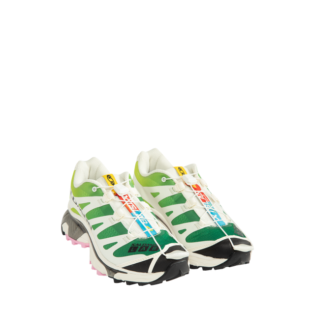 Image 2 of 5 - GREEN - Salomon XT-4 OG Sneakers are crafted from synthetic and textile materials and feature the iconic XT-4 silhouette revived from the archives. Celebrated for its vintage aesthetic, long-lasting comfort, and stable performance, this legendary trail-inspired design returns with refreshed colorways while staying true to the style and functionality that made it a cultural icon. Main Material: Synthetic and Textile Upper. Lining: Textile. Insole: Textile. Outsole: Rubber. Closure: Quicklace S 