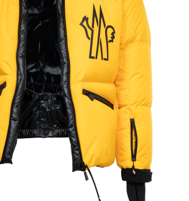 Image 3 of 6 - YELLOW - MONCLER GRENOBLE VERDONS JACKET featuring micro ripstop lining, down-filled, pull-out hood with visor, collar with fleece inner, water-repellent look zipper closure, water-repellent look zipped pockets, inner media pocket, ski pass pocket, windproof powder skirt, jersey wrist gaiters, adjustable cuffs and logo details. 100% polyamide/nylon. Padding: 90% down, 10% feather. 
