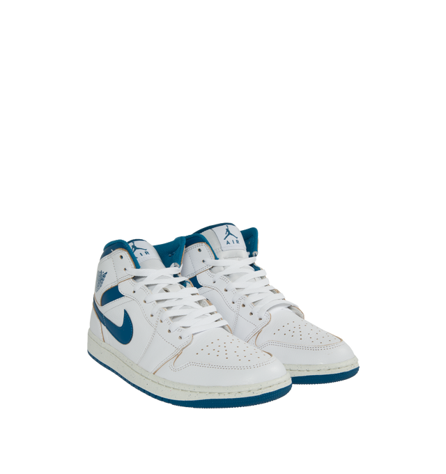 Image 2 of 5 - WHITE - AIR JORDAN 1 MID SE sneakers made of leather and textiles in the upper featuring encapsulated Nike Air-Sole unit for lightweight cushioning, rubber in the outsole for traction, wings logo stamped on collar, stitched-down Swoosh logo and Jumpman Air design on tongue. 