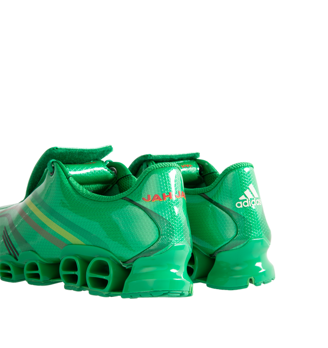 Image 3 of 5 - GREEN - Adidas x Mega Jah Jah Men's F50 TUNIT Mega Jah Jah Shoes feature a bold collaborative design that reimagines an iconic adidas silhouette through a rebellious, street-ready lens. Crafted with a sleek synthetic upper, this statement sneaker combines heritage adidas styling with premium comfort, featuring a soft leather lining and sockliner for an elevated feel. Finished with a durable rubber outsole for reliable traction, the design balances archival inspiration with contemporary attitu 