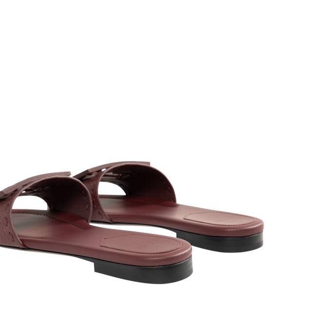 Image 3 of 4 - BROWN - FENDI Baguette Slide featuring wide-band, tumbled leather and embellished with hand-sewn tone-on-tone macro Selleria stitching, an emblem of the iconic Selleria workmanship and tone-on-tone FF Baguette motif. 100% calfskin. Inside: 100% calfskin. Made in Italy. 