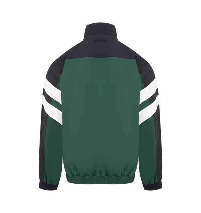 Image 2 of 3 - GREEN - VETEMENTS Track Jacket featuring technical jersey, colour-block design, front two-way zip fastening, mock neck, drop shoulder, long sleeves, stripe detailing, embroidered logo at the chest, two side welt pockets, embroidered logo to the rear and elasticated hem. 100% polyester. 