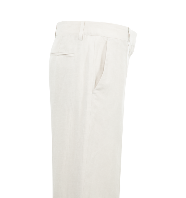 Image 3 of 3 - WHITE - THE ROW Noxy Pant featuring mid-rise tailored trouser in woven silk and linen with wide leg, pressed front and back creases, and slanted side pockets. 52% silk, 48% linen. Lined in 100% silk. Made in Italy. 