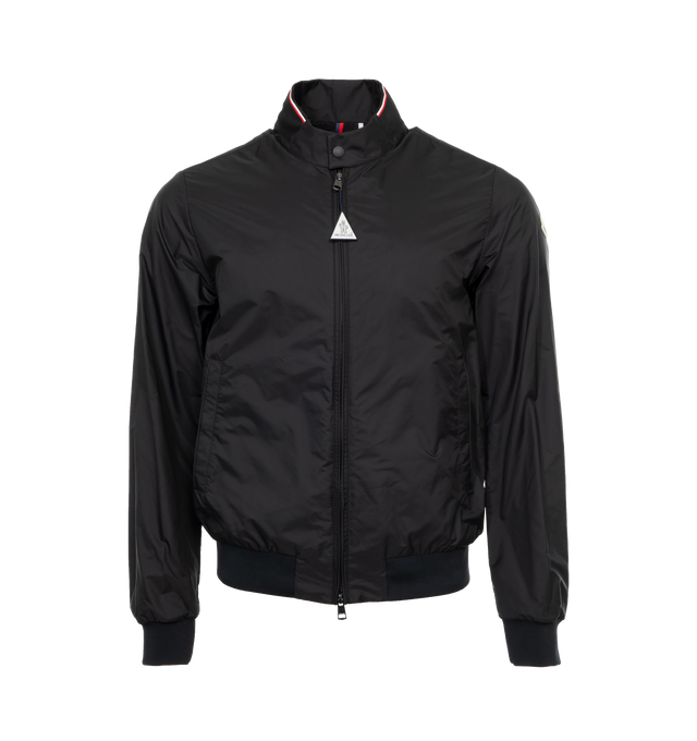 BLACK - MONCLER Reppe Jacket featuring rainwear lining, collar with snap button closure and embossed logo lettering, two-way zipper closure, zipped pockets, ribbed cuffs and hem and logo patch. 100% polyamide/nylon. Made in Romania. 