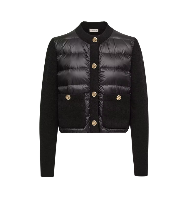 Image 1 of 1 - BLACK - Moncler Women's Boucl Wool Blend Padded Cardigan is crafted from a boucl wool blend and features a down-filled longue saison quilted front, a snap-button closure, and patch pockets with snap-button closures. Designed in a loose fit, this hybrid style combines textured knitwear with lightweight insulated paneling for added warmth and comfort. Main Material: 64% Virgin Wool, 35% Polyamide/Nylon, 1% Elastane. Front: 100% Polyamide/Nylon. Front Lining: 100% Polyamide/Nylon. Padding: 90% D 