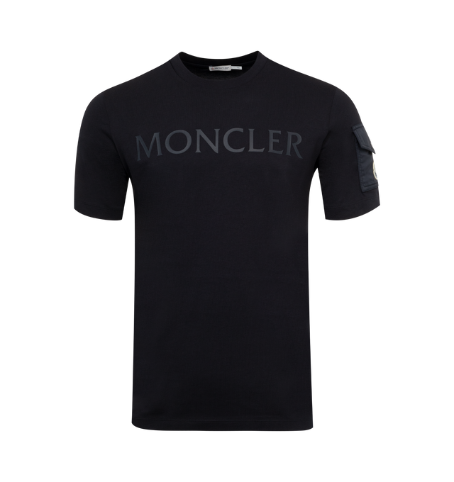 Image 1 of 2 - NAVY - MONCLER Logo T-Shirt featuring logo on front, short sleeves, pocket on sleeve and crewneck. 100% cotton.  