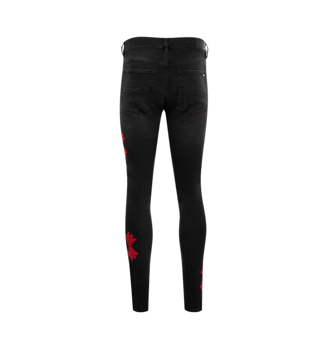 Image 2 of 3 - BLACK - Amiri M.A. Quad Logo Applique Skinny Jeans are a 5-pocket style with brand-inspired applique details.  