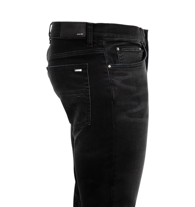 Image 3 of 3 - BLACK - Amiri Starburst Applique Skinny Jeans are a 5-pocket style with a button and zip fly, distressing, signatStarburst Applique Skinny Jeans (Mens) ure brand logo appliques on the left leg, and a regular rise. Cotton, polyester, elastane. Made in USA.  