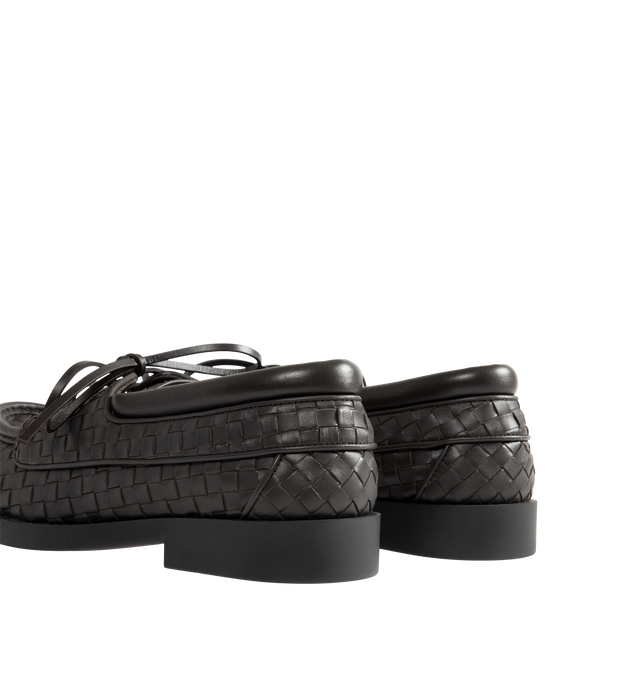 Image 3 of 4 - BROWN - Bottega Veneta Mens Intrecciato Boat Shoes are crafted from Intrecciato calfskin leather. Feature a lace-up boat shoe silhouette, calfskin lining, rubber outsole, and flat heel. Main Material: Calfskin Leather; Lining: Calfskin Leather; Sole: Rubber. Made in Italy. 