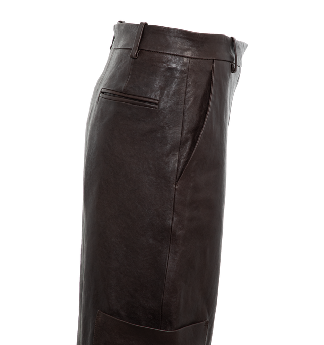 Image 3 of 3 - BLACK - KHAITE Caiton Leather Wide-Leg Cargo Pants featuring cargo pants in lambskin leather with leg patch pockets, mid rise sits high on hip, flat front, angled side slip pockets, back welt pockets, wide legs, full length and hook zip fly and belt loops. Leather. Made in Romania. 