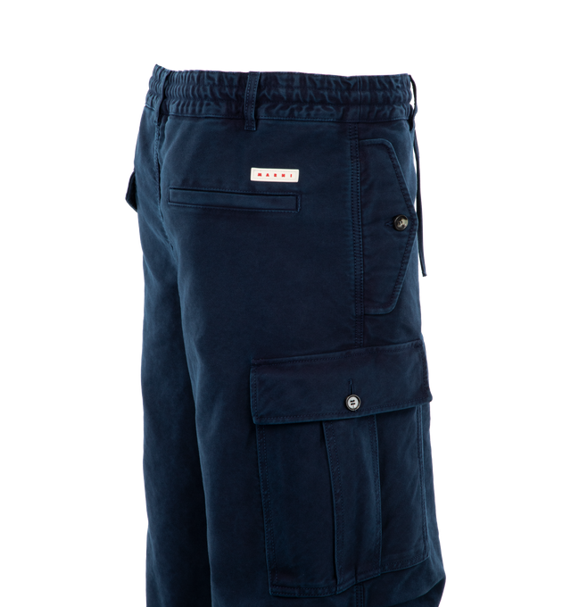 Image 3 of 3 - NAVY - MARNI Cargo-Pocket Trousers featuring logo patch to the rear, belt loops, elasticated waistband, front button fastening, two side slit pockets, two side cargo pockets, rear flap pocket and drawstring cuffs. 100% cotton. 