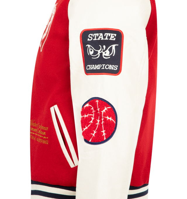 Image 4 of 4 - MULTI - MARKET Old West Varsity Jacket featuring faux leather long sleeves, ribbed neckline, ribbed cuffs and hem, Market brand patches and embroidery, snap-button front closure, side pockets and quilted lining with printed Market graphics. 50% polyester, 50% wool. Sleeves: 100% PU. Lining & filling: 100% polyester. 