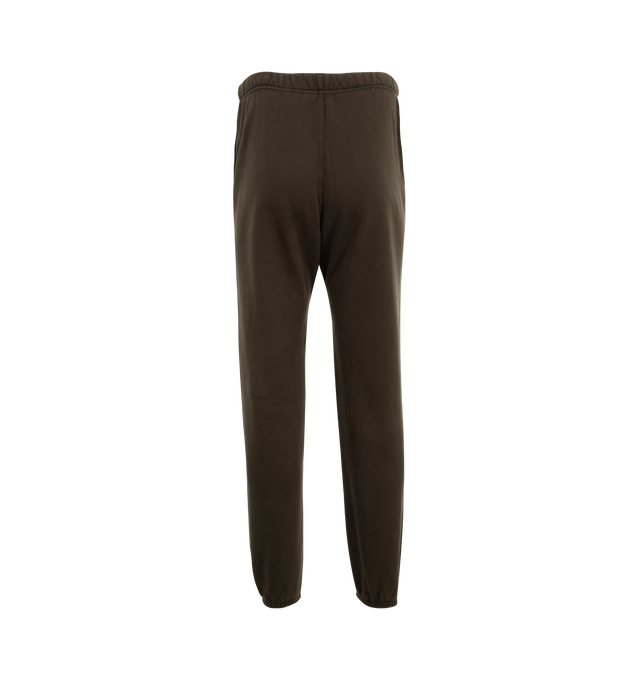 Image 2 of 3 - BROWN - Fear of God Essentials Heavy Fleece Sweatpants have an elastic drawstring waist, 3 stripe side panels, side pockets, elastic at the ankles, and a brand label. 83% cotton, 17% recycled polyester. 