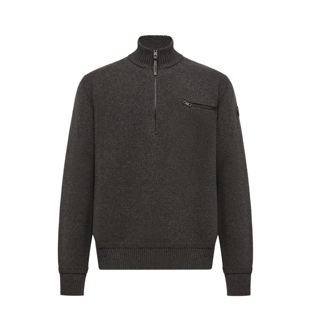 Image 1 of 1 - GREY - Moncler Mens Wool & Cashmere Blend Turtleneck Sweater is crafted from a wool and cashmere blend and features a rib-knit turtleneck, half-zip closure, zipped chest pocket, and double leather logo patch. This designer turtleneck sweater combines premium knit construction with a timeless half-zip silhouette for elevated everyday layering. Main Material: 90% Virgin Wool, 10% Cashmere; Trim: Cow Leather. Made in Romania. 