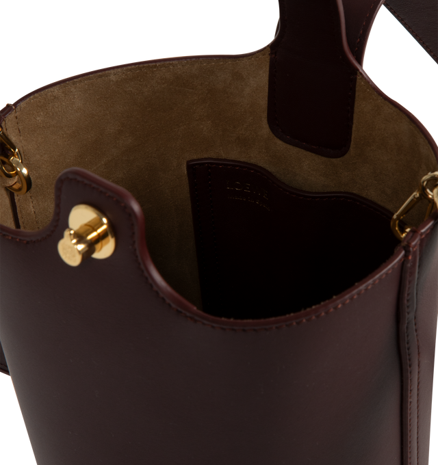 Image 3 of 3 - PURPLE - LOEWE Mini Pebble Bucket Bag featuring magnetic closure, internal pocket, bonded suede lining, anagram engraved Pebble, crossbody, shoulder or hand carry and adjustable and removable strap. 7.7 x 6.3 x 6.3 inches. Mellow Calf. Made in Spain.  