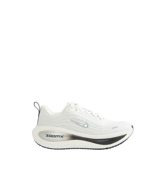 Image 1 of 5 - WHITE - Nike Women's Vomero Plus Running Shoes are engineered with a full-length ZoomX foam midsole and feature Nike's highest level of cushioning for an ultra-soft, responsive ride. Designed for everyday road running, this max-cushion silhouette combines a breathable engineered mesh upper with a high-stack platform and durable rubber outsole for lasting comfort and traction. Main Material: Engineered Mesh. Midsole: Full-Length ZoomX Foam. Outsole: High-Abrasion Rubber. Weight: Approx. 242 g  