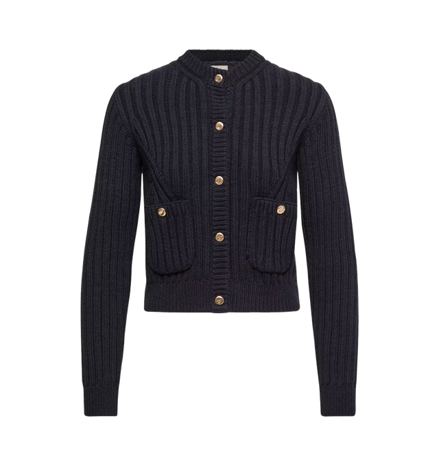 Image 1 of 1 - NAVY - Moncler Womens Cotton Padded Cardigan is crafted from a cotton and nylon blend. Features rib knit construction, a down-filled longue saison back, snap-button closure, pockets with snap-button closures, and a leather logo patch. Base Fabric: 90% Cotton, 10% Polyamide / Nylon; Outer Back: 100% Polyamide / Nylon; Back Lining: 100% Polyamide / Nylon; Padding: 90% Down, 10% Feather; Leather Tag: Calf Leather. Made in Moldova. 