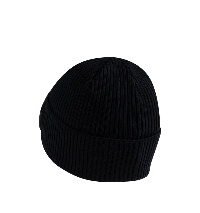 Image 2 of 2 - BLACK - C.P. Company Goggle Beanie features the brand's goggle detail, a ribbed knit design, and a turned-up brim. 100% cotton. Made in Italy. 