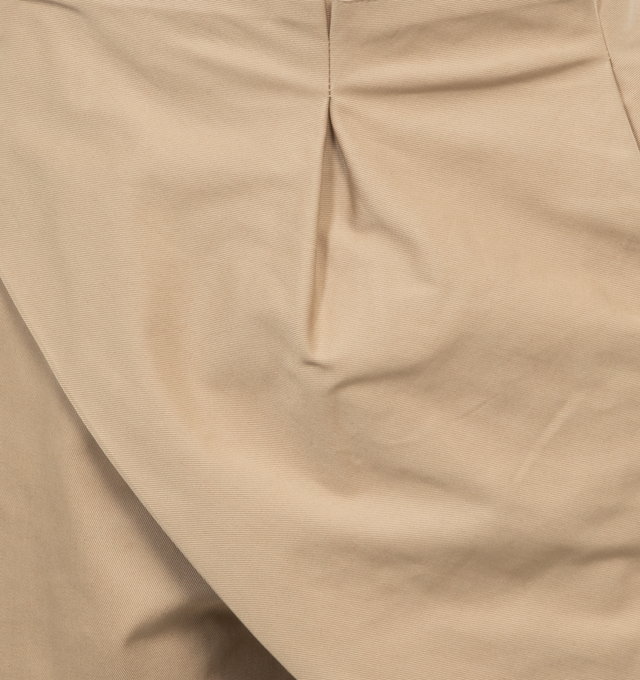 Image 4 of 4 - NEUTRAL - Loewe Shorts crafted in lightweight cotton drill with folded pleats panel at the front. Featuring a relaxed fit, knee length, mid waist, loose leg, side zip fastening, seam pockets, rear welt pocket with Anagram embossed leather tab placed on the rear pocket. 100% cotton. Made in Italy. 