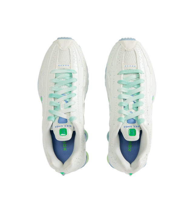 Image 5 of 5 - WHITE - NIKE Shox R4 Sneaker featuring Nike Shox columns provide responsive cushioning, modified, circular waffle outsole, laser perforations throughout, lace up closure and padded collar.  