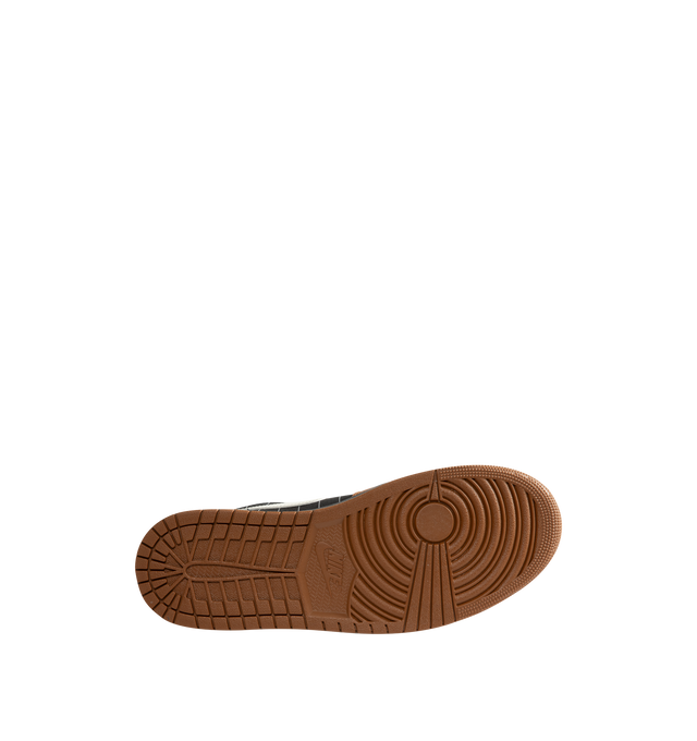 Image 4 of 5 - BROWN - Men's Air Jordan 1 Low SE Sneakers feature a genuine leather and suede upper with the iconic low-top silhouette, signature Wings branding, and a Jumpman logo for a premium take on a timeless classic. These lifestyle sneakers combine encapsulated Air-Sole cushioning with a durable rubber outsole for lightweight comfort, lasting support, and reliable everyday traction. Main Material: Genuine Leather and Suede. Midsole: Encapsulated Air-Sole Unit. Sole: Rubber. 