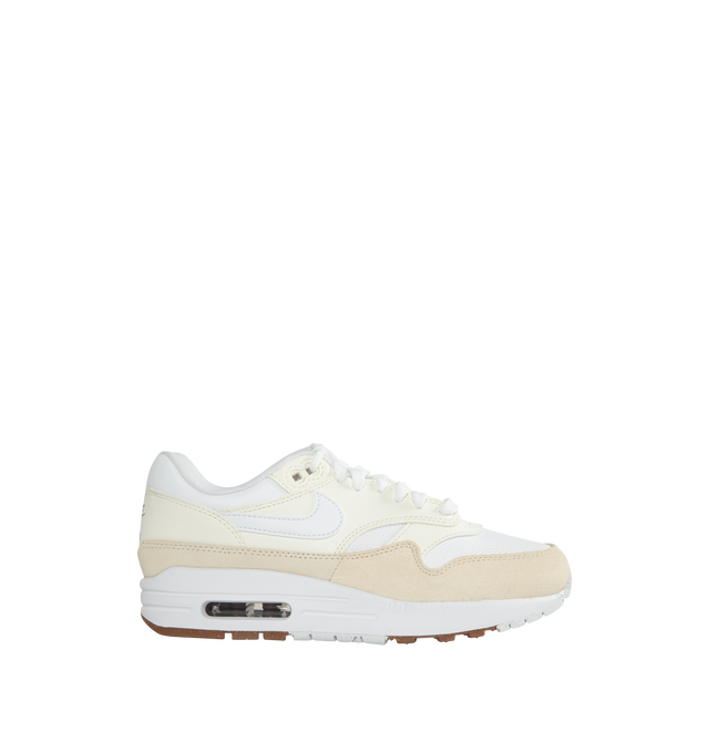 Image 1 of 5 - WHITE - NIKE AIR MAX 1 SC in  Coconut Mil and Sail White combo featuring suede overlays and white mesh in the upper.  Featuring leather and mesh upper, air cushioning and rubber outsole, visible Max Air unit in the heel and Nike Air cushioning in the forefoot. The plush foam midsole and padded, low-cut collar add comfort.Mesh/Leather/Suede upper Padded/Low-cut collar Air cushioning Foam midsole Rubber outsole   