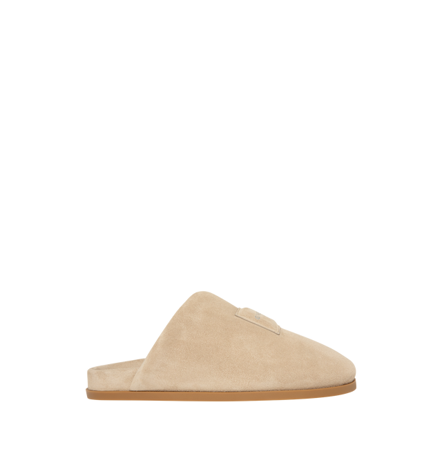 Image 1 of 5 - NEUTRAL - Givenchy Puffy Mules in Suede are crafted from supple calfskin suede and feature the house's signature Puffy silhouette with an asymmetric, slip-on design. Designed with a tonal padded label accented by a silvery Givenchy Paris logo, a branded leather insole, and a raised Givenchy signature beneath the sole, the mules combine comfort with a refined contemporary aesthetic. Main Material: 100% Calfskin Leather. Lining: 100% Calfskin Leather. Made in Italy. 