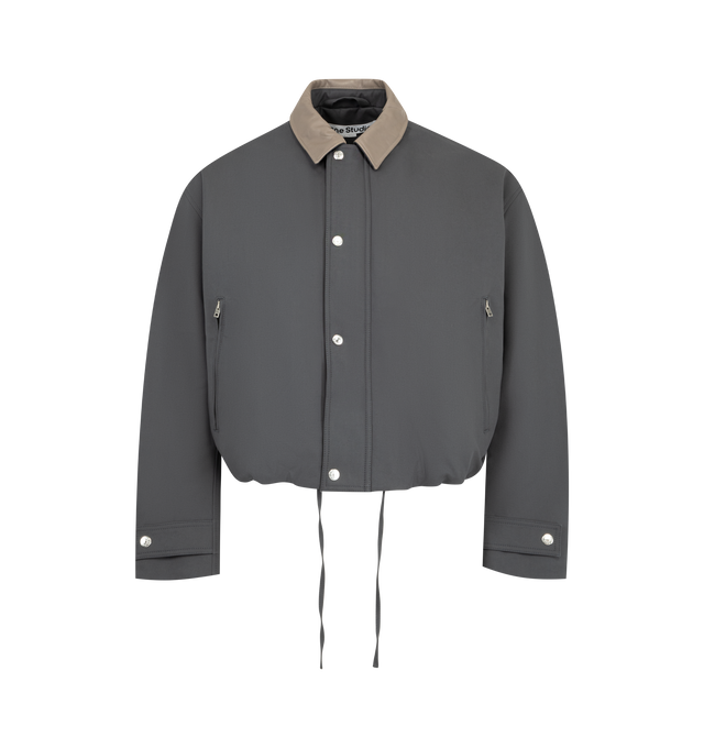 Image 1 of 3 - GREY - Acne Studios Men's Bomber with Leather Collar is crafted from smooth cotton satin and features a leather collar, snap-button front closure, and a regular-fit silhouette. Designed with a below-waist length, the bomber is detailed with zip side pockets, tab snap cuffs, a drawcord hem, and a leather logo patch at the back neckline. Main Material: 100% Cotton. Collar: 100% Cow Leather. Filling: 100% Polyester. Lining: 65% Polyester, 35% Cotton. 