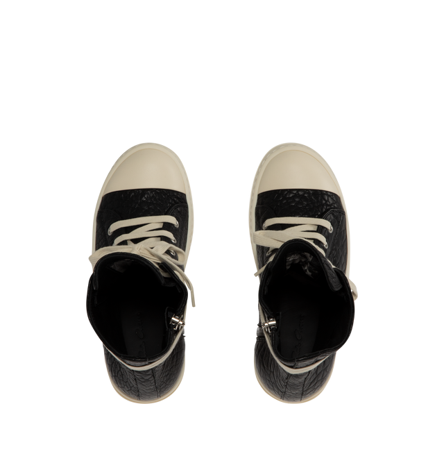 Image 5 of 5 - BLACK - Rick Owens Womens High-Top Sneakers are crafted from textured leather. Feature an above-ankle silhouette, seven-eyelet lace-up closure, inner ankle zip, calf leather toe cap, and signature shark-tooth thermoplastic rubber outsole. Upper: 100%Leather; Toe: 100% Calf Leather; Lining: 100% Calf Leather; Insole: 100% Calf Leather; Outsole: 100% Thermoplastic Rubber. Sole Height: 3.5 cm. Made in Italy. 