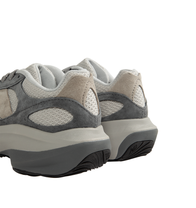 Image 3 of 5 - GREY - New Balance WRPD Runner Sneakers are a lace-up style with knit uppers, full-length Fuel Cell midsoles, wavy outsoles, embroidered N logos, and medial stability posts.  