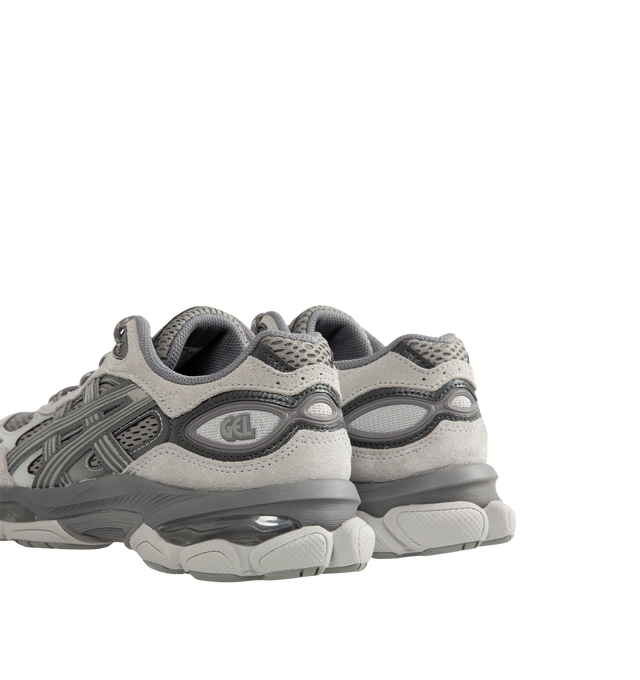 Image 3 of 5 - GREY - Asics Gel-NYC 2.0 Sneaker featuring suede overlays, rearfoot and forefoot GEL technology, shock-attenuating material placed in the midsole of the shoe for cushioning and shock absorption, FF BLAST PLUS cushioning, TPU TRUSSTIC technology, walking-specific flex grooves to support natural movement and smooth heel to toe transition, angled heel softens heel contact with the ground and facilitates more natural heel to toe transitions. 