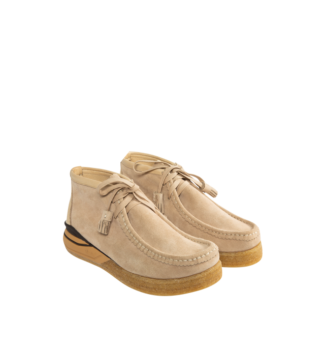 Image 2 of 5 - NEUTRAL - VISVIM Beuys Trekker Folk high moccasins featuring hand-sewn upper crafted from UK vegetable tanned cowhide, crepe non-replaceable outsole, cork insole for enhanced cushioning and moisture absorption, TPU heel stabilizer, and lightweight EVA Phylon midsole. The sizing and fit can vary depending on the style of shoe and its design along with the material used for its construction. Please be aware that the natural leather hides have been specially treated to create a unique texture wh 