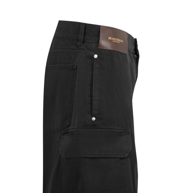 Image 3 of 3 - BLACK - JW Anderson Men's Twisted Patch Pocket Shorts featuring twisted patch pocket shorts, utilitarian detailing and logo embossed leather patch. 100% Cotton. Made in Japan. 