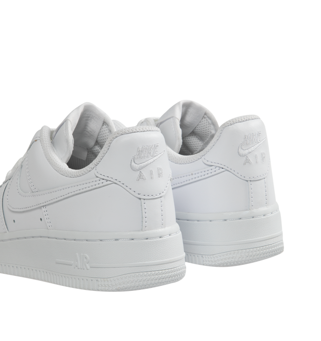 Image 3 of 5 - WHITE - Women's Air Force 1 '07 LX Low-top lace-up sneakers crafted from premium leather and textiles, with a foam midsole and rubber sole. Featuring monochrome white leather upper and graphics,  padded collar,  white rubber outsole with Nike Air cushioning for lightweight, all-day comfort. 