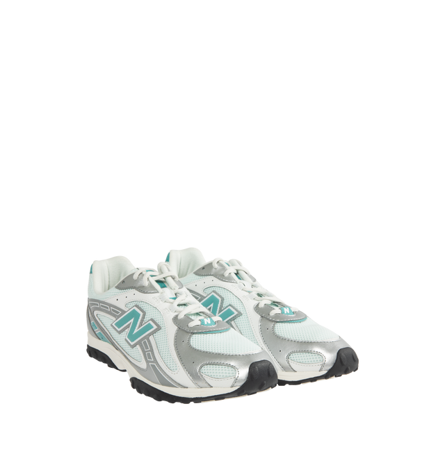 Image 2 of 5 - SILVER - NEW BALANCE 204L Sneaker featuring synthetic upper, EVA outsole, multi-piece upper with embossed overlay, screen-printed graphics along the saddle, distinctive outsole with 2000s-inspired strike path and 70s-influenced tread pattern and double-stacked suede 'N' logo. 