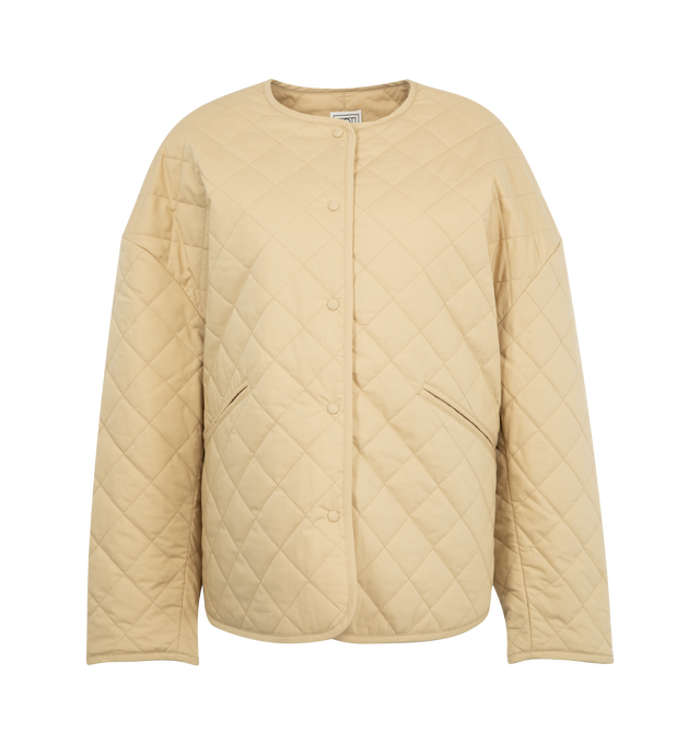 Image 1 of 2 - NEUTRAL - TOTEME Quilted Jacket featuring padded and quilted organic cotton canvas, round neck, press-stud closure, welt pockets, droptail hem, dropped shoulders and full plain-woven cotton lining. 100% organic cotton.  