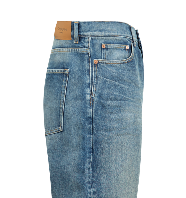 Image 3 of 3 - BLUE - SAINT LAURENT Tapered Jeans featuring mid-rise, five-pocket style, certified cotton, a tapered leg, button fly, waistband with belt loops and logo embossed leather jacron. 100% cotton. Made in Japan. 