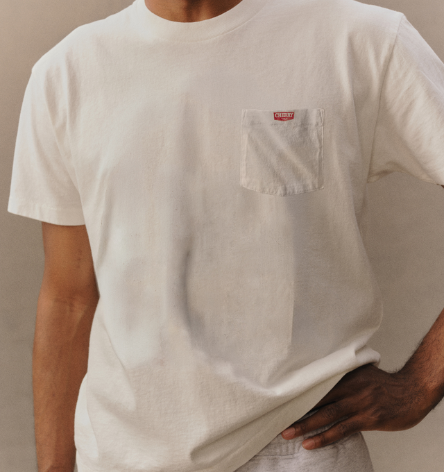 Image 5 of 6 - WHITE - Cherry LA Men's Quality Goods Classic Pocket T-Shirt is crafted from cotton and features a classic-fit silhouette with a rib-knit crew neckline and a chest pocket. Designed as an everyday essential, this versatile style is finished with signature Cherry LA branding and a soft, comfortable construction for effortless wear. Main Material: Cotton. Fit: Classic. Neckline: Crew Neck. Sleeves: Short Sleeve. Pocket: Chest Pocket. Details: Signature Cherry LA Quality Goods Branding. Made in L 