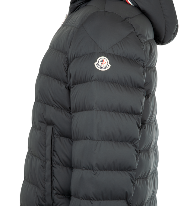 Image 3 of 3 - BLACK - MONCLER Vermeille Hooded Short Down Jacket featuring light micro lining, down-filled, adjustable hood with tricolor trim, zipper closure, pockets with button closure, inside zipped pocket and cuffs and hem with elastic trim. 100% polyester. Padding: 90% down, 10% feather. 
