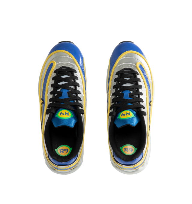 Image 5 of 5 - MULTI - Nike Air Max Joga Bonito R9 Sneakers feature a smooth synthetic leather upper inspired by Ronaldo Nazrio's iconic Mercurial R9 soccer boot and the original 2006 "Joga Bonito" collection. These lifestyle sneakers combine visible Max Air cushioning with a lightweight foam midsole and durable rubber outsole for all-day comfort, responsive support, and heritage-inspired style. Main Material: Synthetic Leather. Midsole: Foam with Visible Max Air Unit. Sole: Rubber. 