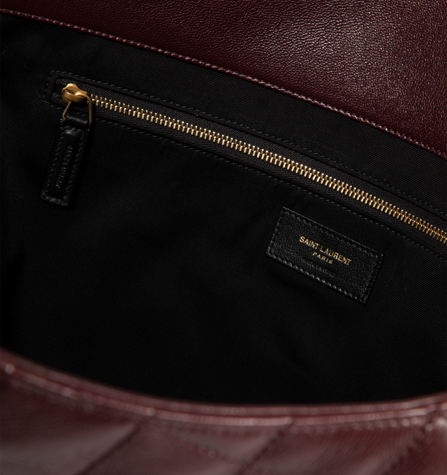 Image 3 of 3 - RED - SAINT LAURENT ICARE Bag in quilted nappa featuring maxi tote in nappa lambskin, diamond-quilted topstitching, inner chain allows the sides to be collapsed or expanded as desired, includes a removable pouch in quilted nappa, leather lining, bronze-tone hardware and detachable chain toggle closure. 14.6"21.7" X 16.9" X 2". Strap drop: 8.3". Lambskin. Made in Italy. 