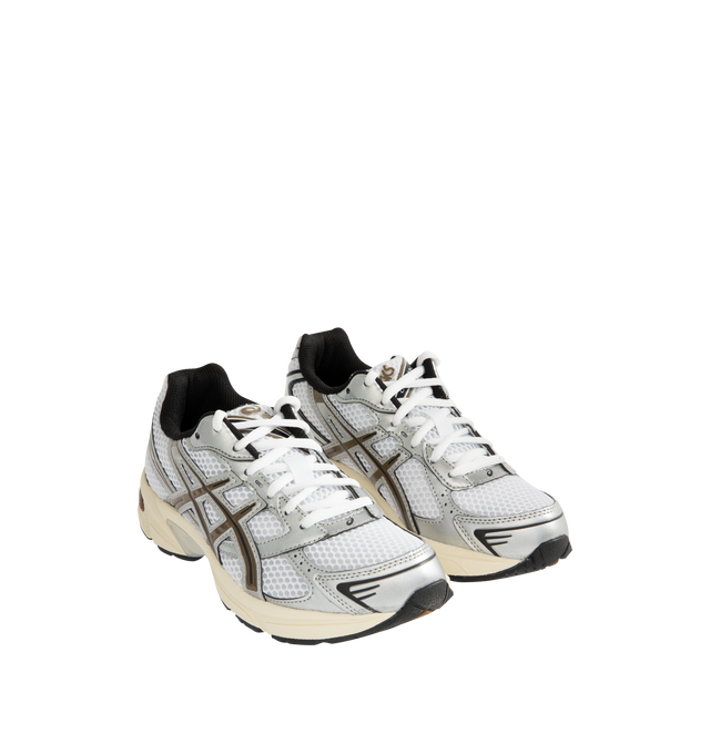 Image 2 of 5 - SILVER - ASICS Gel-1130 Sneaker featuring suede overlays, breathable mesh underlays, synthetic leather paneling, GEL technology in the heel, TRUSSTIC support system and dyed sockliner. 