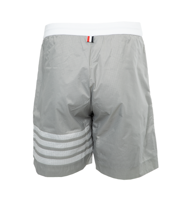 Image 2 of 4 - GREY - THOM BROWNE Mid Thigh 4 Bar Short featuring striped print, logo at the back, logo at the back label, knee length, side pockets. 100% polyamide. 